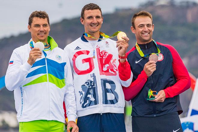 Left to right, Finn class medalists, Rio 2016. Vasilij Zbogar (Slovenia), Giles Scott (Great Britain), Caleb Paine (USA) © Daniel Forster http://www.DanielForster.com